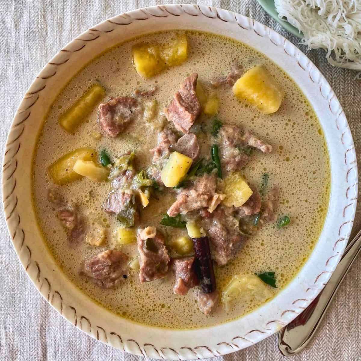 Mutton Stew — Coconut milk broth.. Served at Café Malabar, authentic Kerala & Malabar restaurant at 142 Arab Street, Singapore.