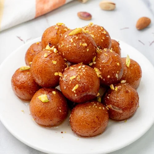 Gulab Jamun (2 pcs). Served at Café Malabar, authentic Kerala & Malabar restaurant at 142 Arab Street, Singapore.