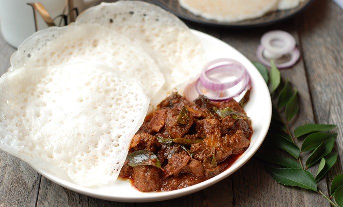Kallappam with Beef — Fermented rice-coconut pancakes with beef roast.. Served at Café Malabar, authentic Kerala & Malabar restaurant at 142 Arab Street, Singapore.