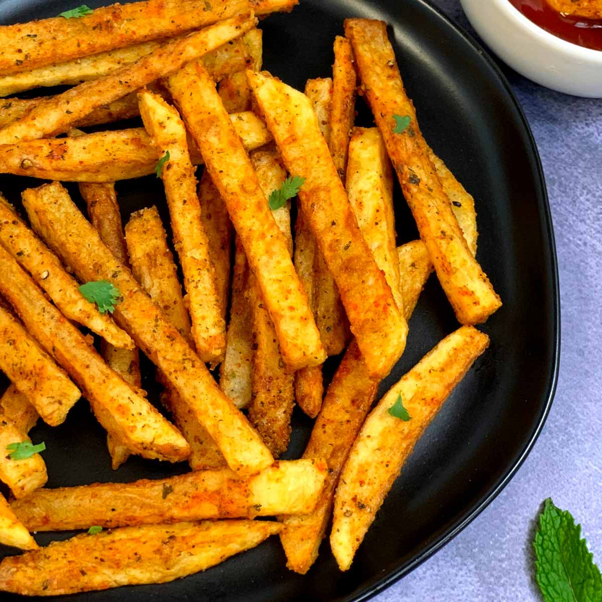 Souq Masala Fries. Served at Café Malabar, authentic Kerala & Malabar restaurant at 142 Arab Street, Singapore.