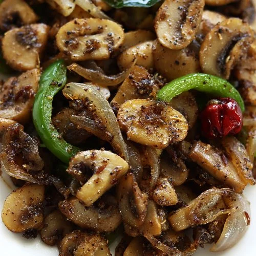 Mushroom Pepper Fry. Served at Café Malabar, authentic Kerala & Malabar restaurant at 142 Arab Street, Singapore.