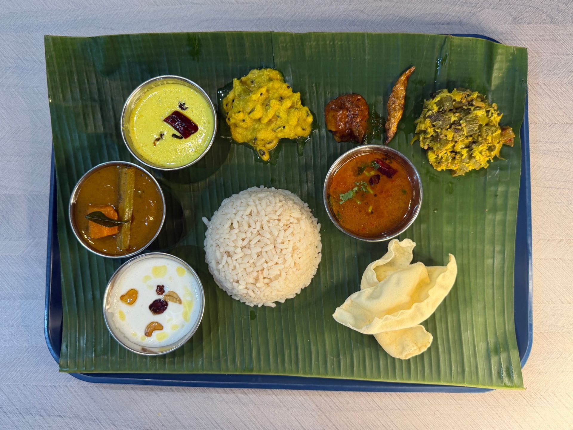 Banana Leaf Meals — Traditional Kerala meals served on banana leaf with rice, curries, and sides.. Served at Café Malabar, authentic Kerala & Malabar restaurant at 142 Arab Street, Singapore.