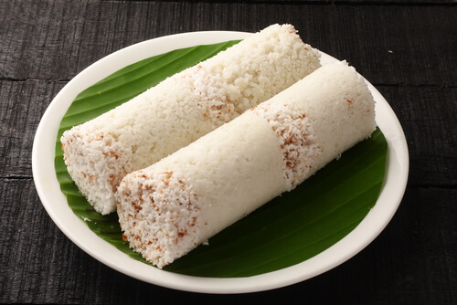 Puttu — Steamed rice cylinders with coconut.. Served at Café Malabar, authentic Kerala & Malabar restaurant at 142 Arab Street, Singapore.