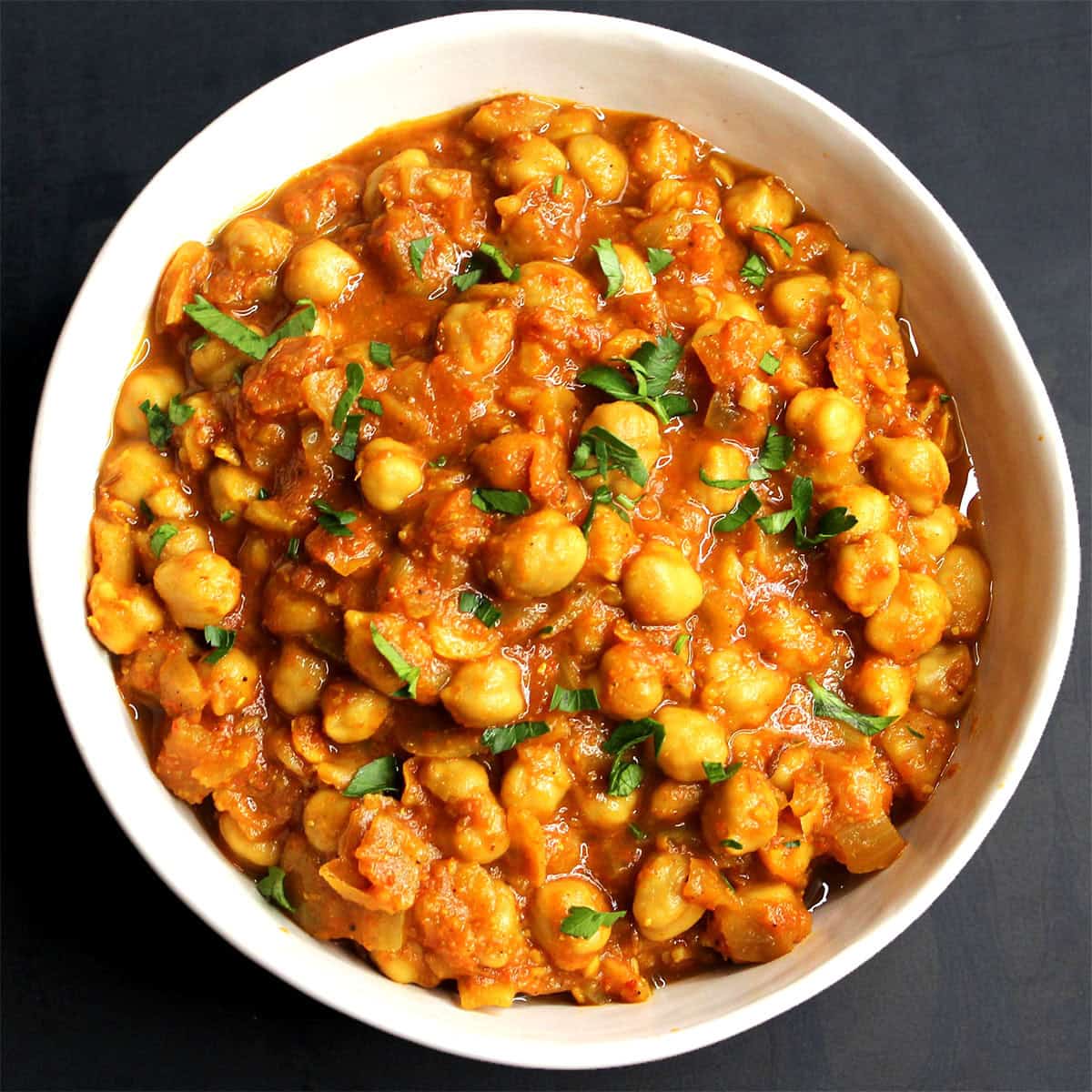 Channa Masala — Chickpeas in spiced tomato gravy.. Served at Café Malabar, authentic Kerala & Malabar restaurant at 142 Arab Street, Singapore.