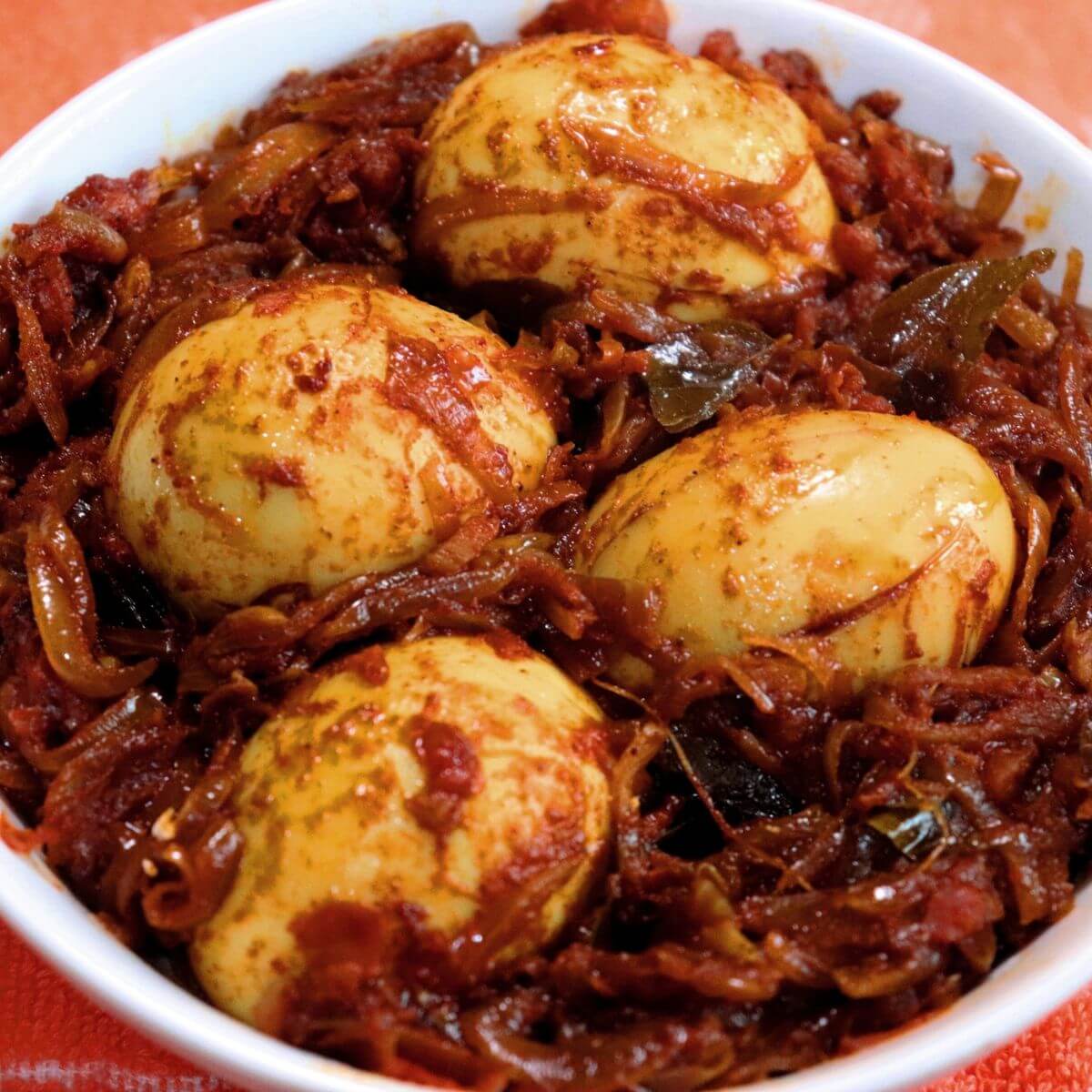 Egg Roast — Onion-tomato gravy.. Served at Café Malabar, authentic Kerala & Malabar restaurant at 142 Arab Street, Singapore.