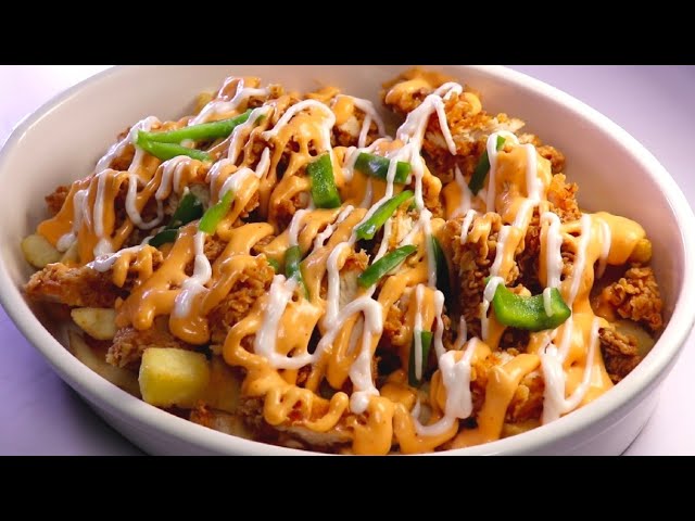 Chicken 65 Loaded Fries. Served at Café Malabar, authentic Kerala & Malabar restaurant at 142 Arab Street, Singapore.