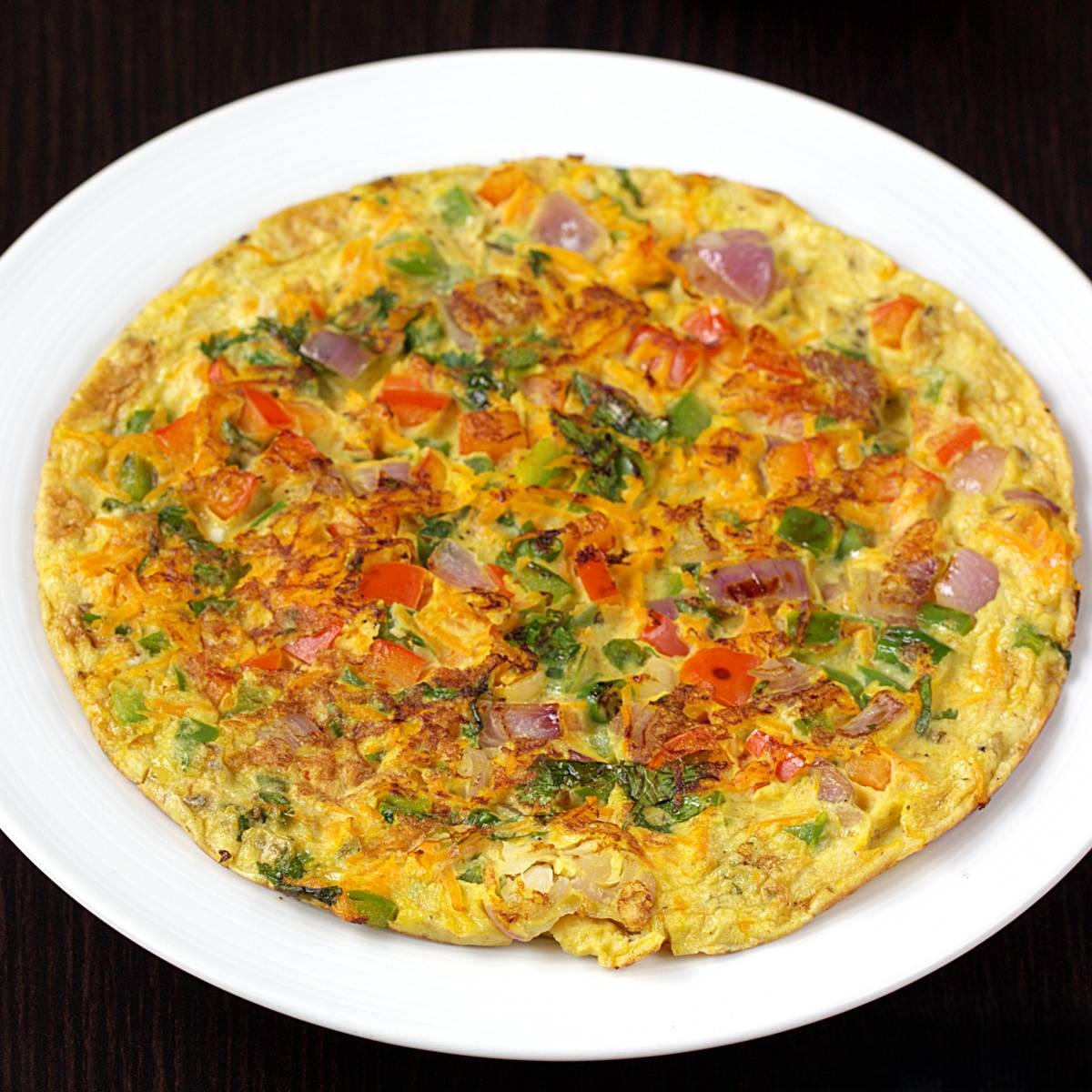 Omelette. Served at Café Malabar, authentic Kerala & Malabar restaurant at 142 Arab Street, Singapore.